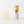 Sparkling ginger kombucha can next to a glass